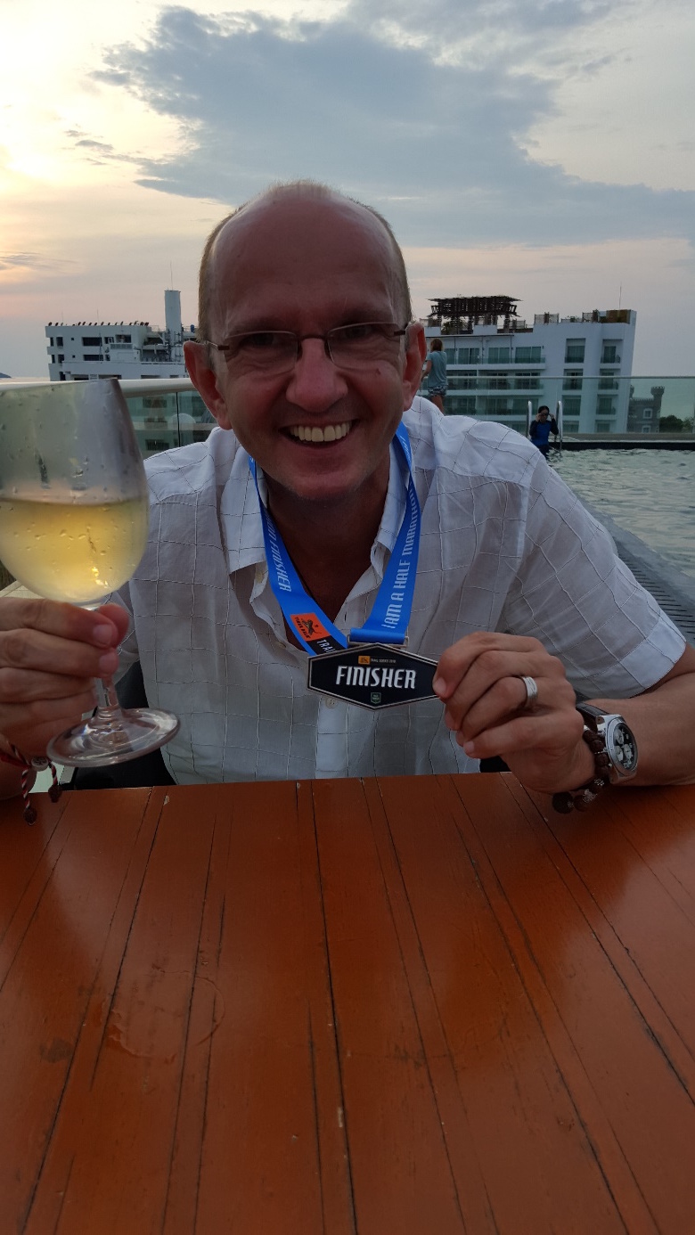 Felix celebrating extensively after the tough Pattaya trail marathon 