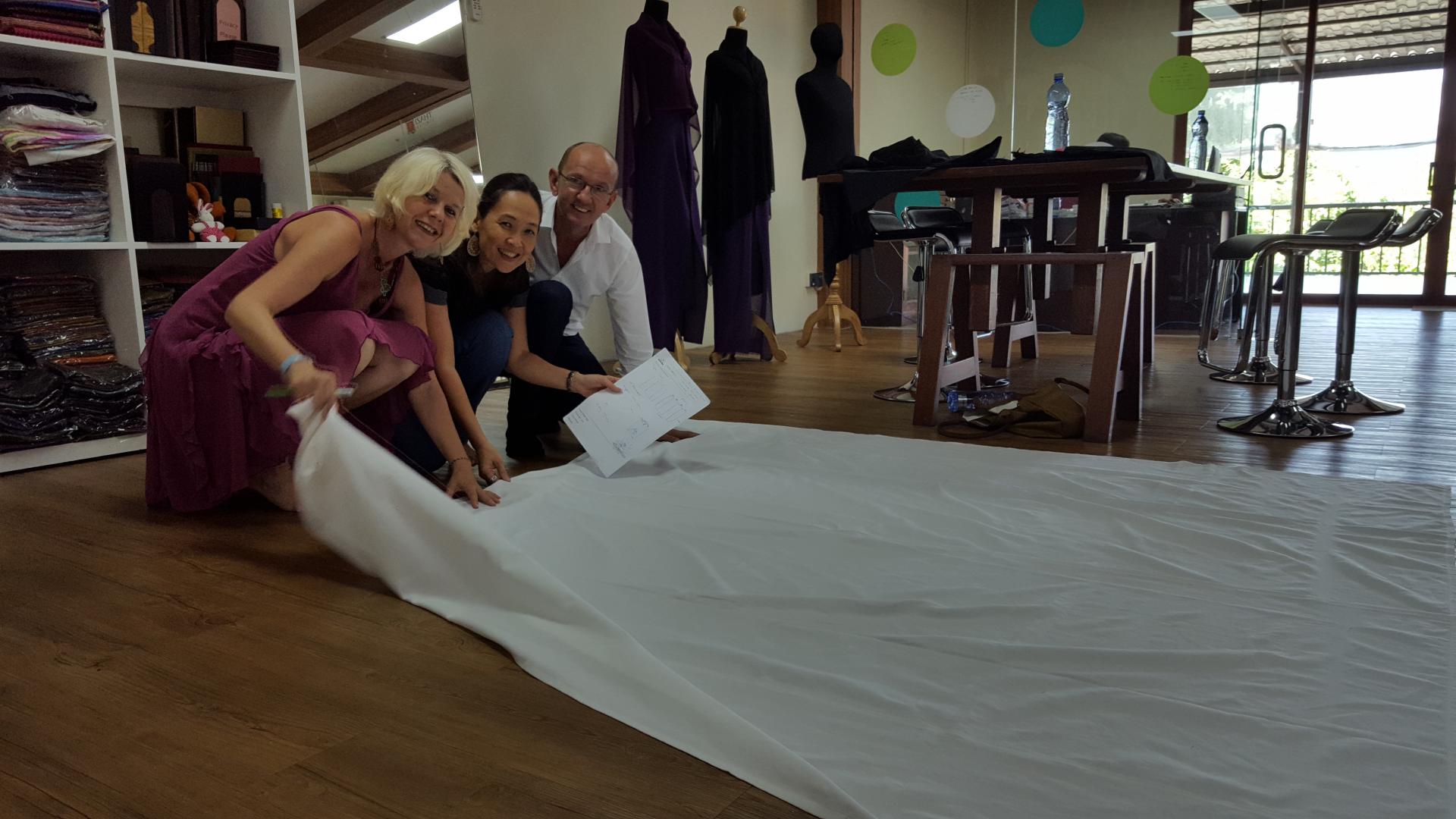 All three of us face the challenge of designing table cloths with Myanmar looms being only 90cm wide- with wide smiles!